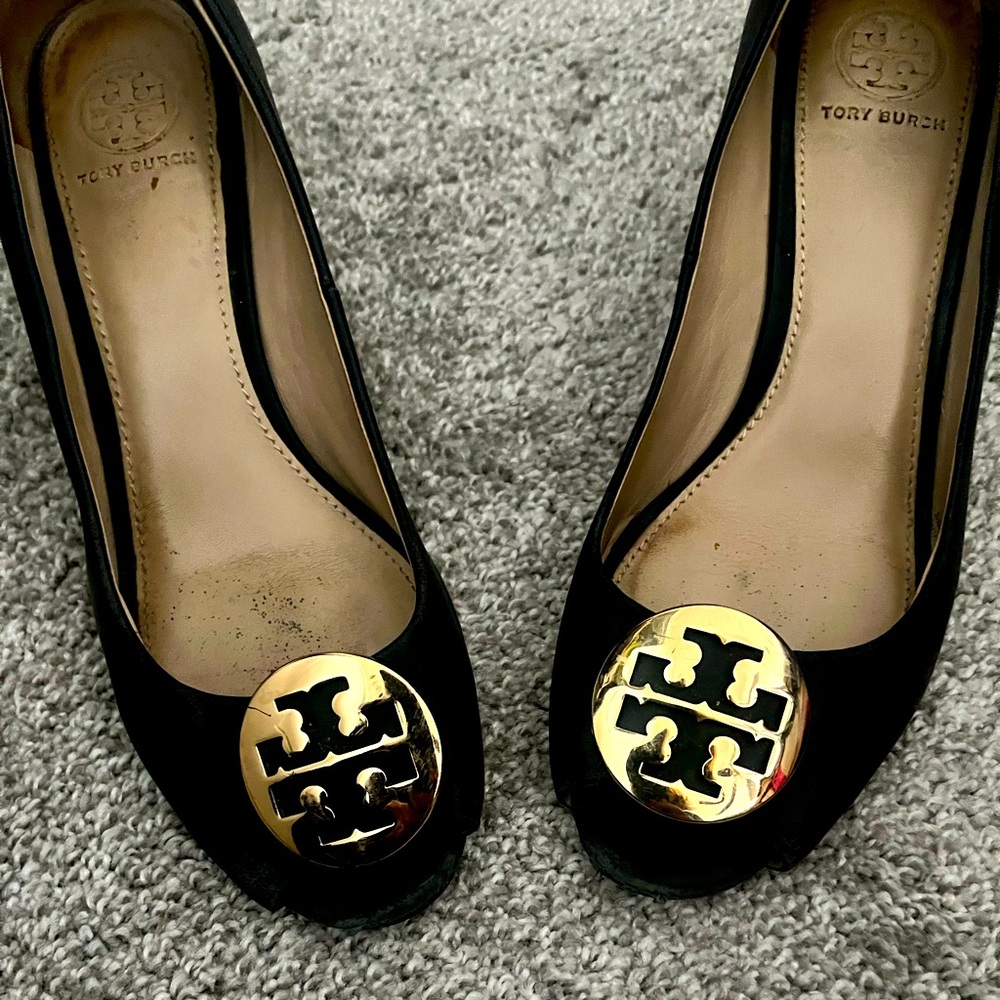 Tory Butch black wedges. Gold logo.